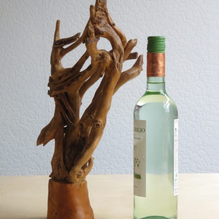 Free standing Ivy and hardwood. Handcrafted sculpted Ivy joined to a hardwood base .