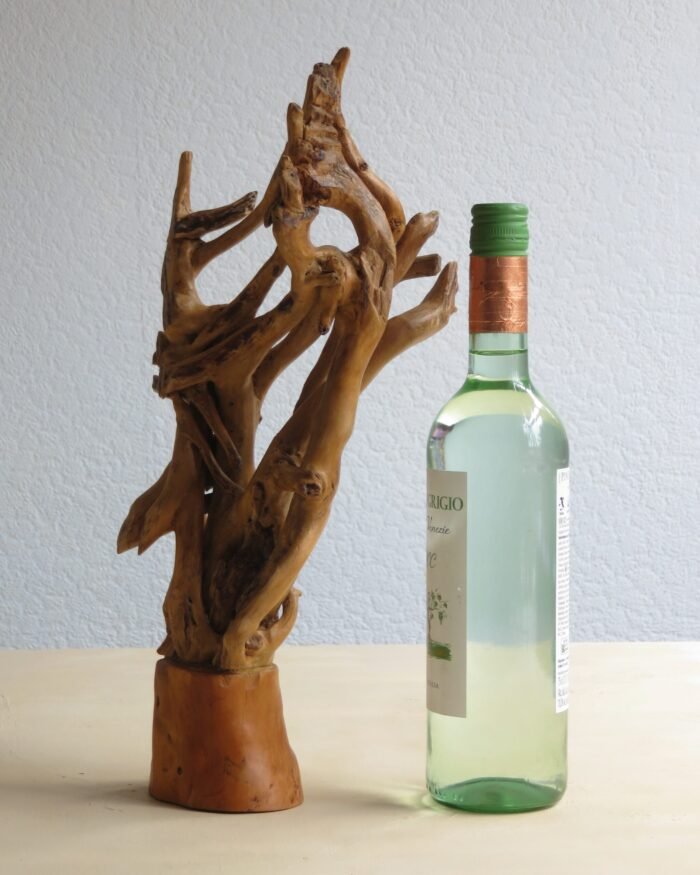 Free standing Ivy and hardwood. Handcrafted sculpted Ivy joined to a hardwood base .