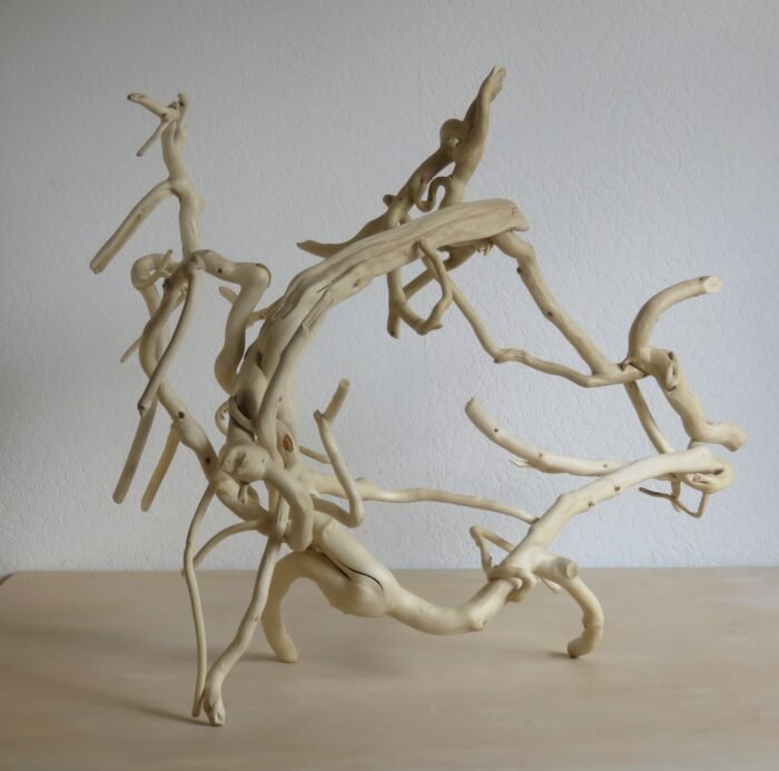 Free-standing or wall mounted unique and versatile. Crafted by hand from Ivy wood.