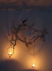 Add lanterns to turn this carefully crafted wood sculpture into something that commands attention.