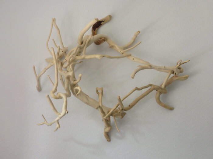 A wall mounted or free standing Ivy wood sculpture