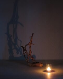 handcrafted combination of hardwood and Ivy a truly unique sculpture.