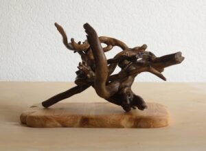 A free standing Handcrafted and unique Ivy wood sculpture.