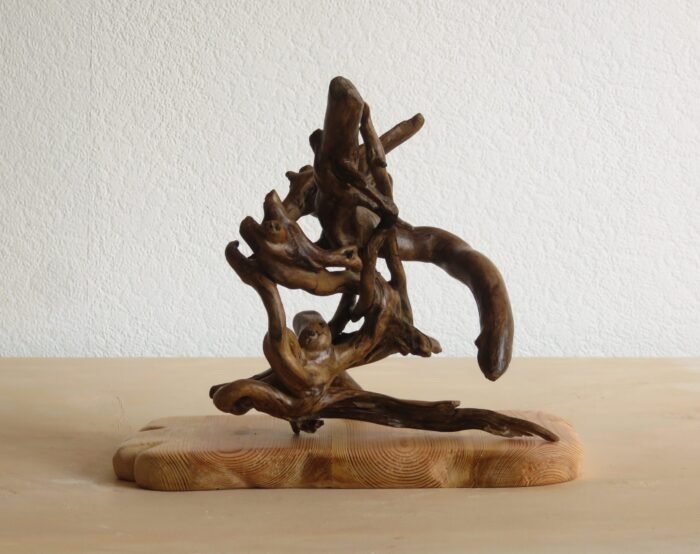 Free standing Ivy with plinth This handcrafted wooden Ivy sculpture can be rotated to different positions to suit you.