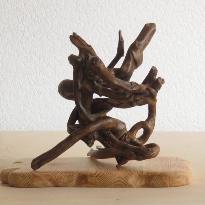 Free standing Ivy with plinth Ivy sculpture, free standing and multi positional. Handcrafted, burnished and polished to bring out its unique colouration and shape.