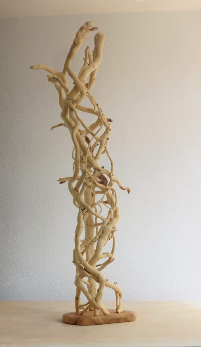 Tall free stranding Ivy on base.) Handcrafted Ivy wooden sculpture. Mounted on a sturdy base that can be rotated.