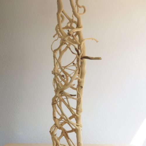 A one-of-a-kind piece of wooden sculptural art handcrafted from Ivy.